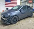 Серый Тесла Model Y, объемом двигателя 0 л и пробегом 200 тыс. км за 14399 $, фото 1 на Automoto.ua