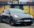 Серый Тесла Model Y, объемом двигателя 0 л и пробегом 107 тыс. км за 23999 $, фото 1 на Automoto.ua