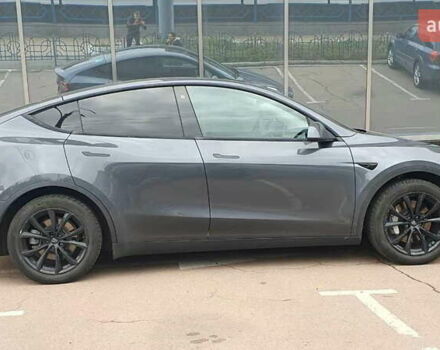 Серый Тесла Model Y, объемом двигателя 0 л и пробегом 84 тыс. км за 24999 $, фото 5 на Automoto.ua
