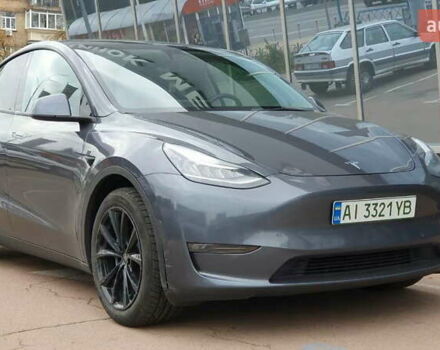 Серый Тесла Model Y, объемом двигателя 0 л и пробегом 84 тыс. км за 24999 $, фото 1 на Automoto.ua