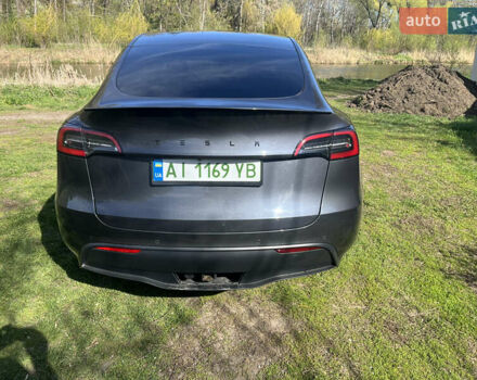 Серый Тесла Model Y, объемом двигателя 0 л и пробегом 68 тыс. км за 33000 $, фото 3 на Automoto.ua