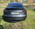 Серый Тесла Model Y, объемом двигателя 0 л и пробегом 68 тыс. км за 33000 $, фото 3 на Automoto.ua