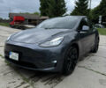 Серый Тесла Model Y, объемом двигателя 0 л и пробегом 95 тыс. км за 25000 $, фото 1 на Automoto.ua
