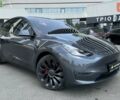 Серый Тесла Model Y, объемом двигателя 0 л и пробегом 26 тыс. км за 27200 $, фото 1 на Automoto.ua
