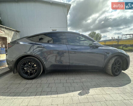 Серый Тесла Model Y, объемом двигателя 0 л и пробегом 55 тыс. км за 29000 $, фото 3 на Automoto.ua