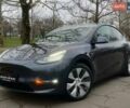 Серый Тесла Model Y, объемом двигателя 0 л и пробегом 92 тыс. км за 24499 $, фото 1 на Automoto.ua