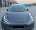 Серый Тесла Model Y, объемом двигателя 0 л и пробегом 28 тыс. км за 24500 $, фото 1 на Automoto.ua