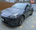 Серый Тесла Model Y, объемом двигателя 0 л и пробегом 27 тыс. км за 25900 $, фото 1 на Automoto.ua