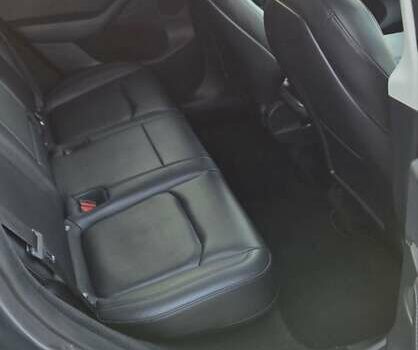 Серый Тесла Model Y, объемом двигателя 0 л и пробегом 77 тыс. км за 25499 $, фото 10 на Automoto.ua