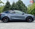 Серый Тесла Model Y, объемом двигателя 0 л и пробегом 56 тыс. км за 28500 $, фото 1 на Automoto.ua