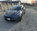 Серый Тесла Model Y, объемом двигателя 0 л и пробегом 110 тыс. км за 28850 $, фото 4 на Automoto.ua