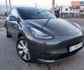 Серый Тесла Model Y, объемом двигателя 0 л и пробегом 74 тыс. км за 26999 $, фото 1 на Automoto.ua