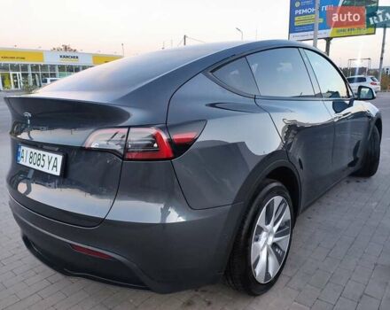 Серый Тесла Model Y, объемом двигателя 0 л и пробегом 74 тыс. км за 26999 $, фото 7 на Automoto.ua