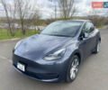 Серый Тесла Model Y, объемом двигателя 0 л и пробегом 24 тыс. км за 29490 $, фото 1 на Automoto.ua