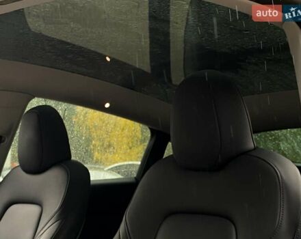 Серый Тесла Model Y, объемом двигателя 0 л и пробегом 61 тыс. км за 30999 $, фото 12 на Automoto.ua