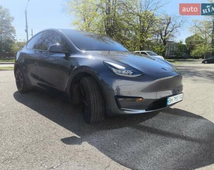 Серый Тесла Model Y, объемом двигателя 0 л и пробегом 77 тыс. км за 30999 $, фото 1 на Automoto.ua