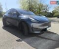 Серый Тесла Model Y, объемом двигателя 0 л и пробегом 77 тыс. км за 30999 $, фото 1 на Automoto.ua