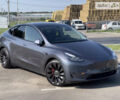 Серый Тесла Model Y, объемом двигателя 0 л и пробегом 27 тыс. км за 33000 $, фото 1 на Automoto.ua