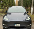 Серый Тесла Model Y, объемом двигателя 0 л и пробегом 58 тыс. км за 25000 $, фото 1 на Automoto.ua