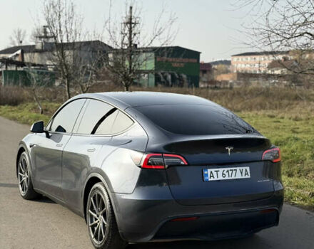 Серый Тесла Model Y, объемом двигателя 0 л и пробегом 84 тыс. км за 22999 $, фото 4 на Automoto.ua
