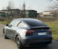 Серый Тесла Model Y, объемом двигателя 0 л и пробегом 84 тыс. км за 22999 $, фото 4 на Automoto.ua