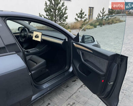 Сірий Тесла Model Y, об'ємом двигуна 0 л та пробігом 65 тис. км за 25500 $, фото 26 на Automoto.ua