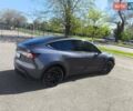 Серый Тесла Model Y, объемом двигателя 0 л и пробегом 77 тыс. км за 30999 $, фото 23 на Automoto.ua