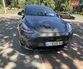 Серый Тесла Model Y, объемом двигателя 0 л и пробегом 50 тыс. км за 26500 $, фото 3 на Automoto.ua