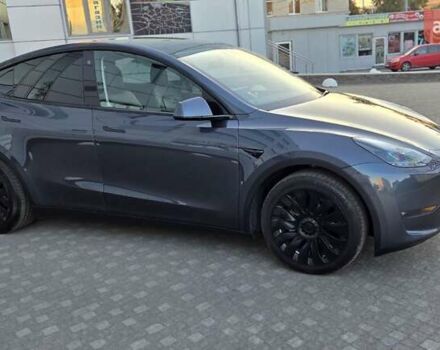 Серый Тесла Model Y, объемом двигателя 0 л и пробегом 77 тыс. км за 25499 $, фото 5 на Automoto.ua