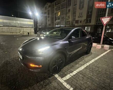 Серый Тесла Model Y, объемом двигателя 0 л и пробегом 64 тыс. км за 28999 $, фото 3 на Automoto.ua