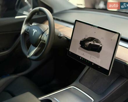 Серый Тесла Model Y, объемом двигателя 0 л и пробегом 54 тыс. км за 26000 $, фото 16 на Automoto.ua