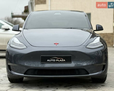 Серый Тесла Model Y, объемом двигателя 0 л и пробегом 53 тыс. км за 28000 $, фото 2 на Automoto.ua