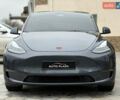 Серый Тесла Model Y, объемом двигателя 0 л и пробегом 53 тыс. км за 28000 $, фото 2 на Automoto.ua