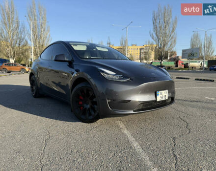 Серый Тесла Model Y, объемом двигателя 0 л и пробегом 99 тыс. км за 24999 $, фото 1 на Automoto.ua