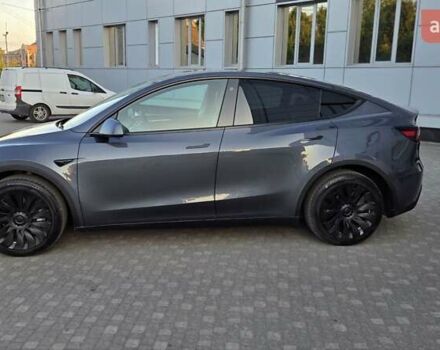Серый Тесла Model Y, объемом двигателя 0 л и пробегом 77 тыс. км за 25499 $, фото 3 на Automoto.ua