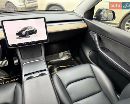 Серый Тесла Model Y, объемом двигателя 0 л и пробегом 53 тыс. км за 28000 $, фото 48 на Automoto.ua