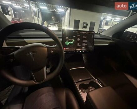 Серый Тесла Model Y, объемом двигателя 0 л и пробегом 64 тыс. км за 28999 $, фото 4 на Automoto.ua