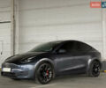Серый Тесла Model Y, объемом двигателя 0 л и пробегом 64 тыс. км за 26300 $, фото 1 на Automoto.ua