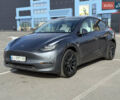 Серый Тесла Model Y, объемом двигателя 0 л и пробегом 26 тыс. км за 23200 $, фото 1 на Automoto.ua