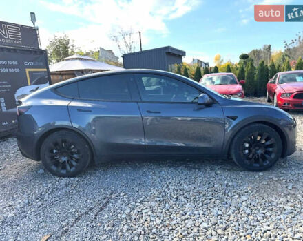 Серый Тесла Model Y, объемом двигателя 0 л и пробегом 85 тыс. км за 24500 $, фото 1 на Automoto.ua