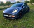Серый Тесла Model Y, объемом двигателя 0.53 л и пробегом 75 тыс. км за 25900 $, фото 1 на Automoto.ua