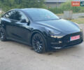 Серый Тесла Model Y, объемом двигателя 0 л и пробегом 139 тыс. км за 24200 $, фото 1 на Automoto.ua