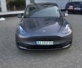 Серый Тесла Model Y, объемом двигателя 0 л и пробегом 77 тыс. км за 25499 $, фото 1 на Automoto.ua