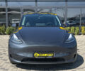 Серый Тесла Model Y, объемом двигателя 82 л и пробегом 22 тыс. км за 27000 $, фото 1 на Automoto.ua