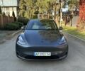Серый Тесла Model Y, объемом двигателя 0 л и пробегом 28 тыс. км за 32999 $, фото 2 на Automoto.ua