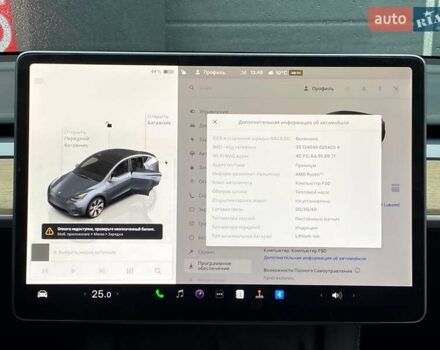 Серый Тесла Model Y, объемом двигателя 0 л и пробегом 61 тыс. км за 30999 $, фото 21 на Automoto.ua