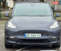 Серый Тесла Model Y, объемом двигателя 0 л и пробегом 54 тыс. км за 26500 $, фото 1 на Automoto.ua