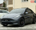 Серый Тесла Model Y, объемом двигателя 0 л и пробегом 53 тыс. км за 28000 $, фото 1 на Automoto.ua