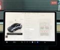 Серый Тесла Model Y, объемом двигателя 0 л и пробегом 61 тыс. км за 30999 $, фото 18 на Automoto.ua