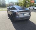 Серый Тесла Model Y, объемом двигателя 0 л и пробегом 77 тыс. км за 30999 $, фото 17 на Automoto.ua